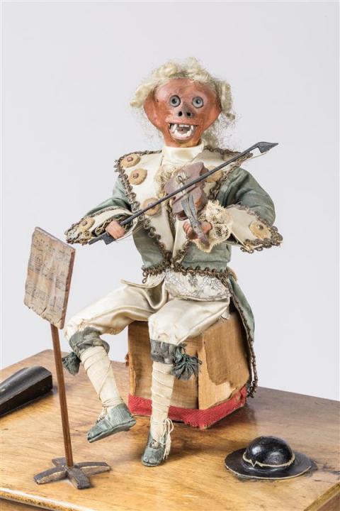 Ancien jouet en tôle tête en celluloïd Ancien jouet en tôle tête en celluloïd