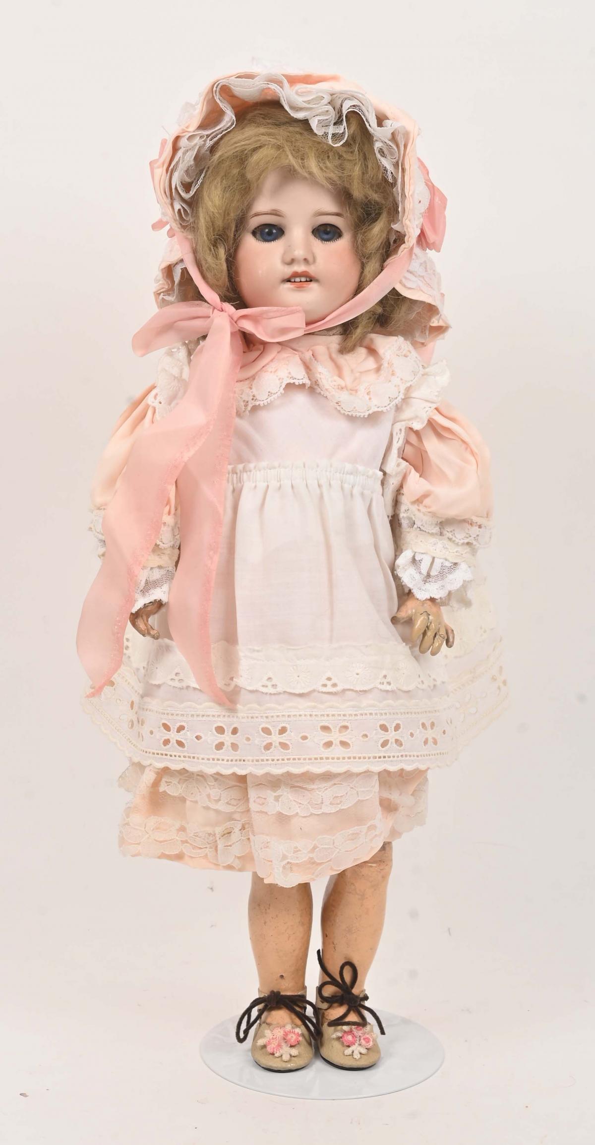 Poupée tête porcelaine SFBJ non marquée, taille 2, yeux bleus dormeurs, corps tout ar
