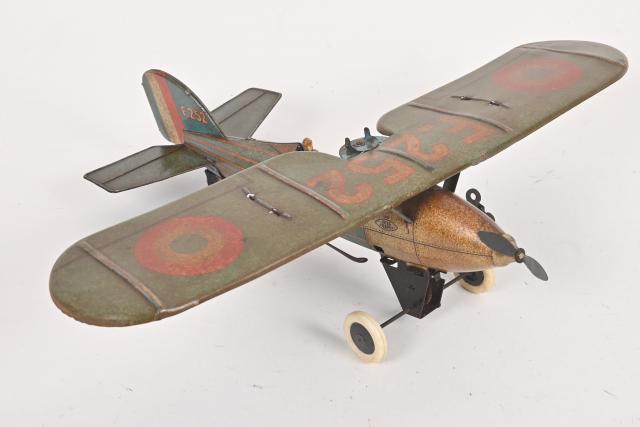 Anciens jouets tôle oiseaux et avion mécaniques
