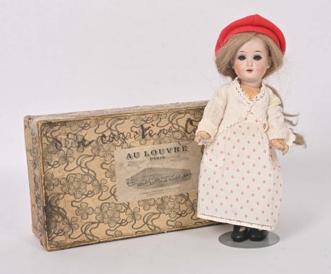 petite poupée de collection en porcelaine articulée