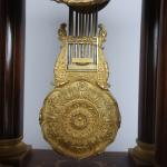 Pendule portique d'époque Charles X en placage de palissandre et...