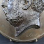 GODIN H. : Médaillon circulaire en métal représentant un portrait...