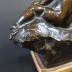 ROUSSEAU Victor (1865-1954) : Fillette nue sur un rocher. Bronze...