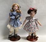 Deux poupées tête porcelaine 6/0 (33cm et 27 cm) -...
