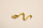 Elément de pendentif en or jaune "Serpent" sur pavage de...