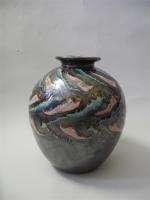 Camille THARAUD (1878-1956) à Limoges Vase globulaire en porcelaine irisée,...