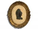 PROFIL de Louis XIV en bronze patiné, présenté dans un...