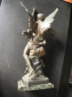 Emile PICAULT (1833-1915). Bronze dépatiné sur un socle en marbre...