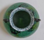 DAUM # Nancy
Vase boule en verre vert à décor d'inclusions...