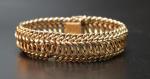 Bracelet en or jaune 18K (750) 25,6 g / L....