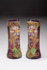 Montjoye attribué à
Paire de vases émaillés à décor floral polychrome...