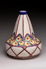 Longwy. Vase piriforme en céramique à émaux polychromes à décor...