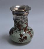 Félix Optat MILET (1838-1911)
Vase en faïence émaillée à décor végétal...