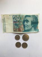 Un BILLET de 20 Francs Suisse, une PIECE de 2...