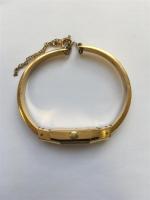 MONTRE bracelet rigide de dame en or jaune 750/°° et...