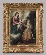 Ecole ESPAGNOLE vers 1630. "La Vierge à l'Enfant recevant le...
