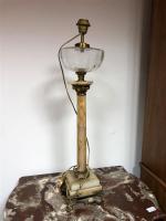 LAMPE à pétrole en albâtre et bronze doré. H. 80...