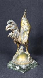 Charles PAILLET (1871-1937). Coq Gaulois triomphant en bronze doré, sur...
