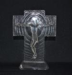 R. LALIQUE
Christ
Epreuve en verre blanc moulé pressé, modèle créé en...