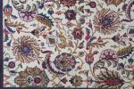 Tapis d'Orient noué en laine à décor floral. 283 x...