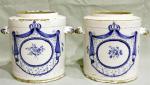 Deux pots en faïence fin XVIIIe à décor bleu couronne...