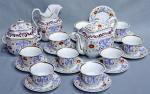 Service à thé en porcelaine de Paris comprenant neuf tasses,...