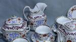 Service à thé en porcelaine de Paris comprenant neuf tasses,...