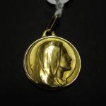 Médaille religieuse en or jaune 750 millièmes à l'effigie de...