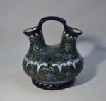 AMPHORA
Vase à anse en céramique émaillée à décor de personnage...