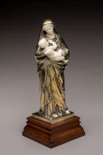 Léon Morice (1868- ?)
« Vierge à l'enfant »
Groupe en bronze...
