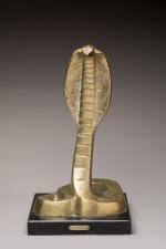 « Naja »
Serpent dressé en bronze doré sur socle en...
