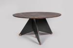André Sornay (1902-2000)
Table à système à plateau rond en bois...