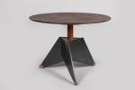 André Sornay (1902-2000)
Table à système à plateau rond en bois...