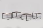 Pierre Guariche (1926-1995)
Ensemble de quatre tables basses carrées formant une...