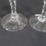 Suite de quatre verres en cristal soufflés de forme cornets,...
