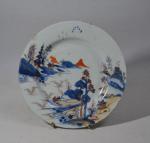 CHINE
Assiette ronde en porcelaine à décor Imari de paysages
XVIIIème
D.: 23...