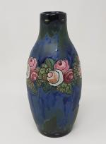 KERAMIS - un vase à décor floral en frise- signé...