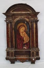 Un autel à la Vierge en bois peint, encadrement en...