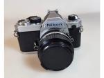 Un appareil photo reflex 35mm NIKON FM - obj. Nikkor...