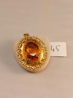Pendentif or 18 carats ornée d'une pierre jaune- H.4,7 x...