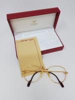 CARTIER,"Must" : Monture de lunettes en métal doré - attaches...
