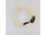 CARTIER "Panthère" : bracelet composé de six rangs de perles...