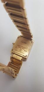 CARTIER - "Tank française" - montre-bracelet de dame en or...