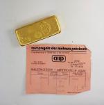 Lingot d'or avec son bulletin d'essai
Compagnie des métaux précieux -...
