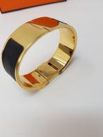 HERMES - "Loquet" - montre-bracelet de dame en acier plaqué...