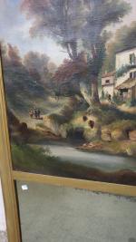 Miroir trumeau orné d'une huile sur toile représentant un paysage...