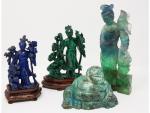 Un lot de quatre statuettes en pierre sculptée - Chine...