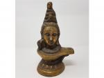 Une tête de divinité en bronze - Extrême-Orient - XXème...
