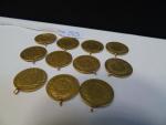 11 Pièces de 10 francs avec anneaux Or 18 carats...