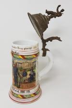 Une chope de conscrit allemand en porcelaine - à décor...